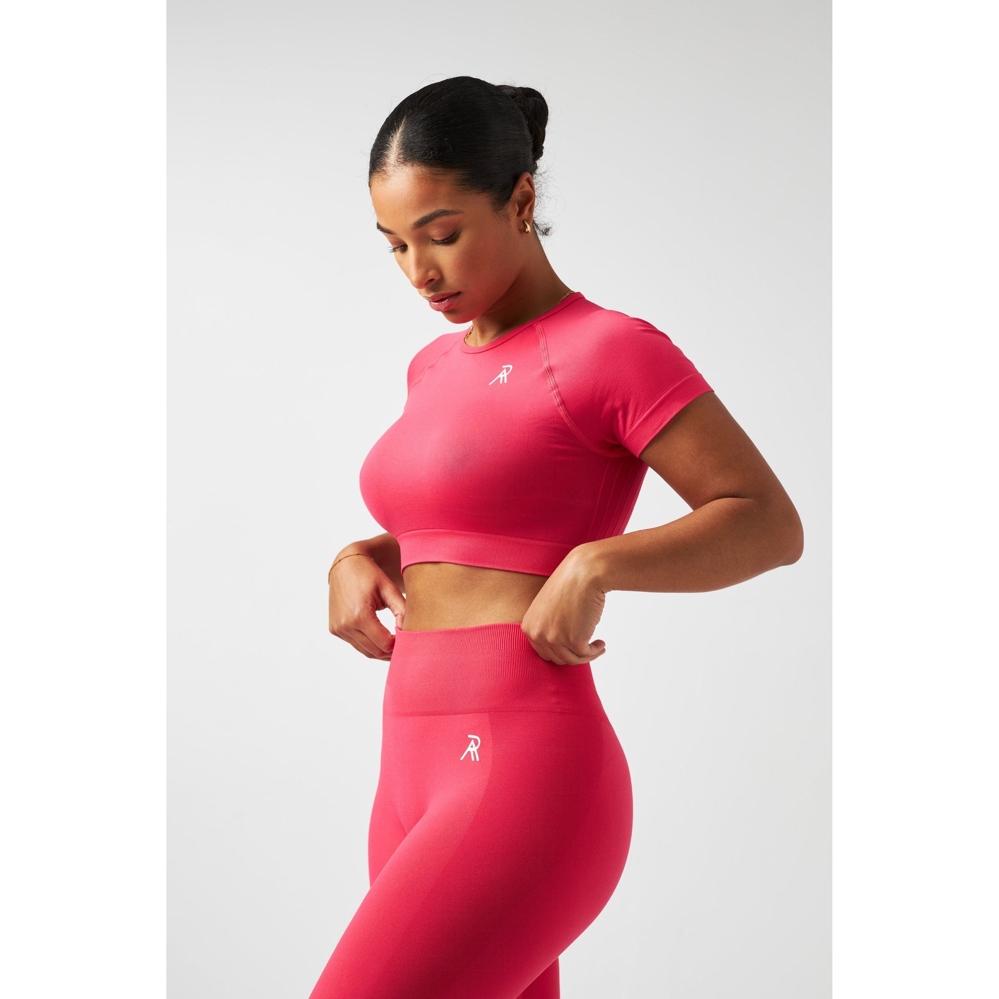 Elegant signature crop top designed for sophisticated casual wear.