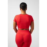 Elegant signature crop top designed for a stylish and modern look in contemporary fashion.
