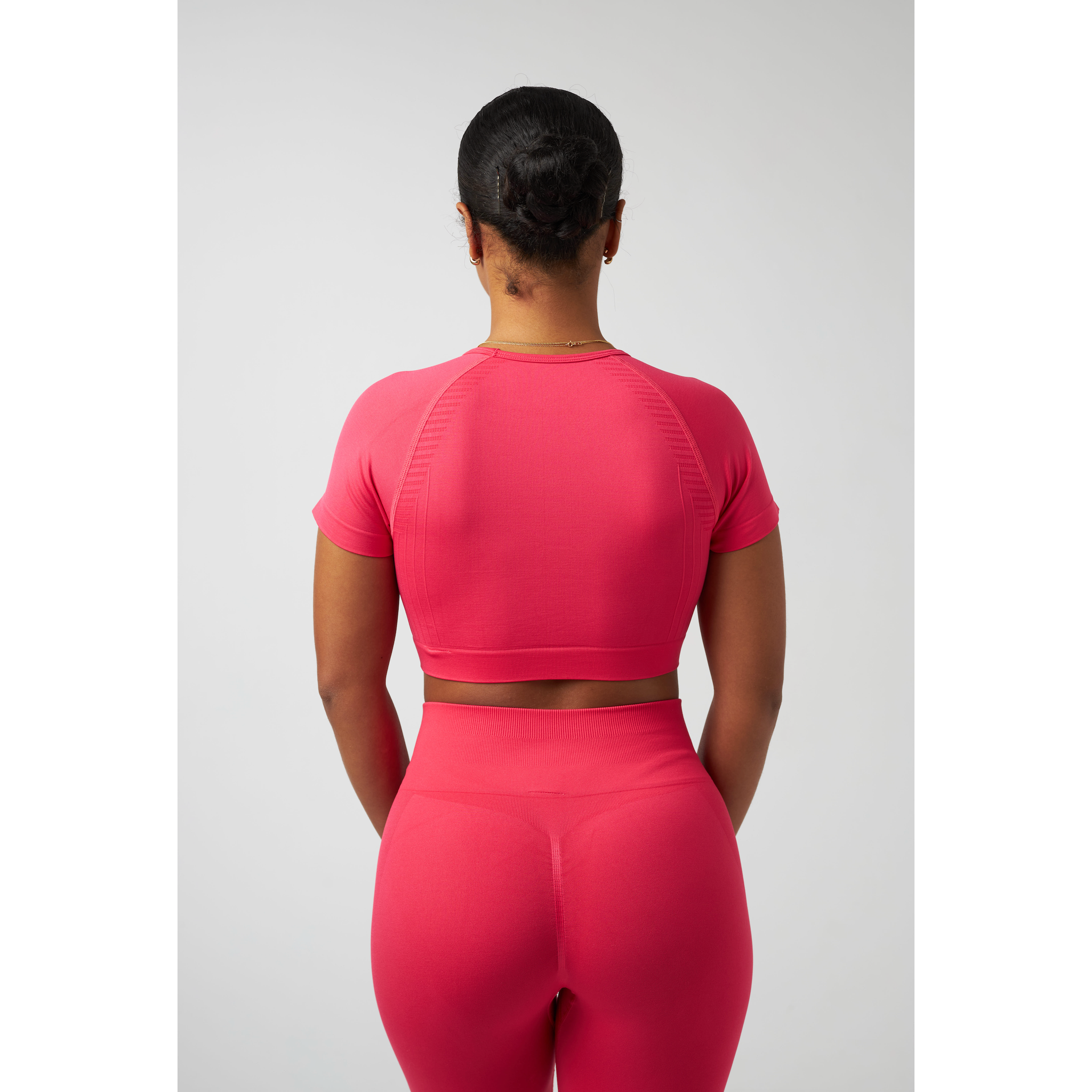 Elegant signature crop top designed for sophisticated casual wear.